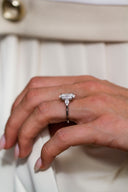 Camilla ring with oval center stone and pear side stones